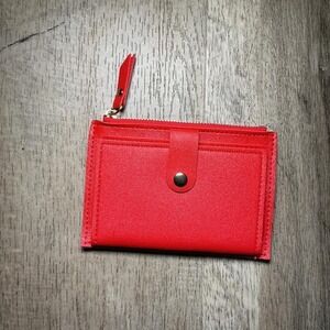 Red leather card holder with zipper